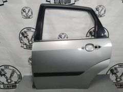 Двері задня ліва гола світло-сіра 4, 5 дв. седани Ford Focus '98-'05